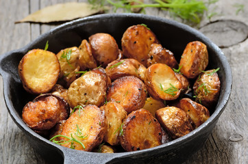 Roasted potato in a frying pan