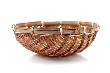 Bamboo basket over white background