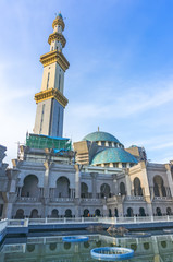 Fototapeta na wymiar Beautiful building of wilayah mosque with blue skies background