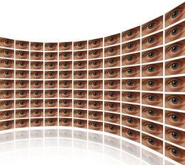 Curved wall of video screens with eyes