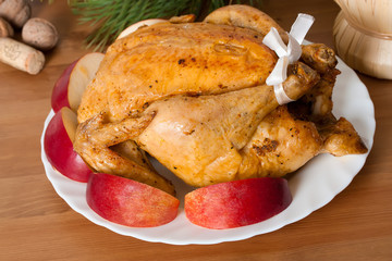 Whole roasted chicken with apples