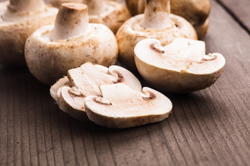 Champignons on the wooden table