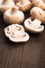 Champignons on the wooden table