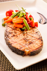 salmon steak with vegetables
