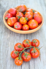 tomatoes in a wooden plate