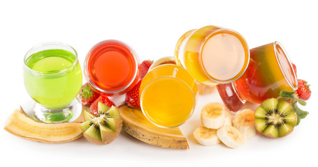 banana jelly, kiwi and strawberry on a white background