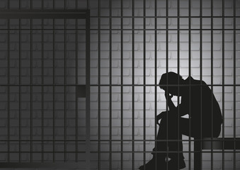 Fototapeta Concept de la prison et de l’arrestation d’un délinquant ou d’un criminel, avec un prisonnier qui assis dans sa cellule qui se tient la tête dans les mains. obraz