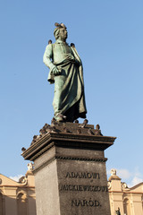 Fototapeta premium Krakow - the sculpture of Adam Mickiewicz on the main square