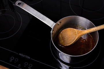 Saucepan with meltet sugar