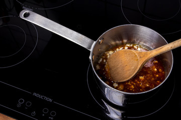 Saucepan with meltet sugar
