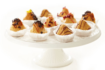 plate of biscuit cakes on a white background