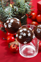 Chocolate cake pops decorated with sugar stars