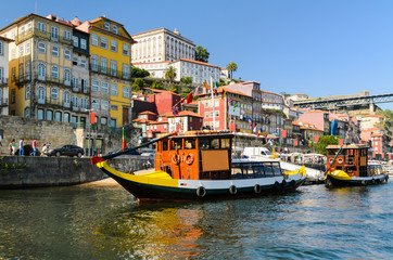 Boats on the Douro river in Porto, Portugal - obrazy, fototapety, plakaty