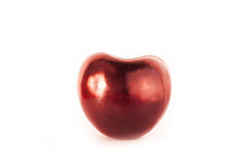 red plum in the form of heart on white isolated background