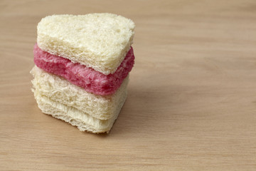Red colored heart shape of bread