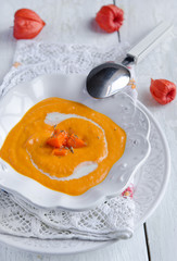 Pumpkin soup on the white background