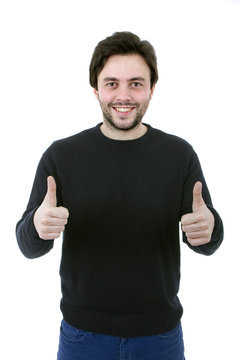 Young casual man making the ok gesture on a white background