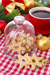 Delicious Christmas cookies in jar on table close-up