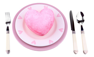 Heart on plate, isolated on white