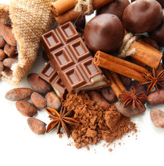 Composition of chocolate sweets, cocoa and spices, isolated