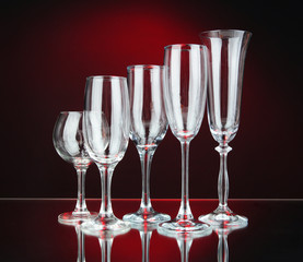 Collection of wine glasses, on dark color background
