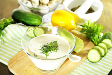 Cucumber yogurt in glass bowl,