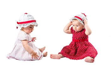 Two cute child girl  isolated on white background.