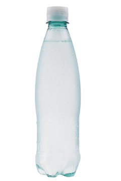 Misted plastic bottle of water with water drops on the surface