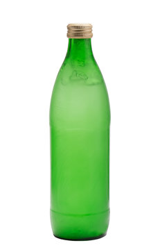 Green glass bottle with frozen water inside