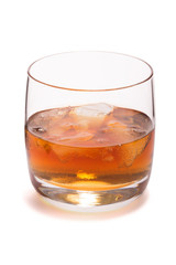 Glass of whiskey with ice isolated on white background