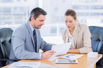 Smartly dressed colleagues in business meeting