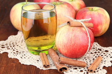 Ripe apples with with cinnamon sticks