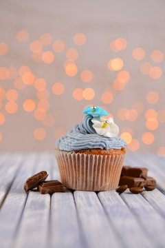 Tasty cupcake with butter cream,