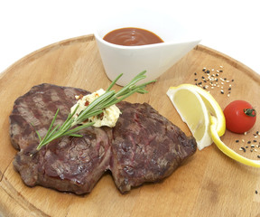 steak grilled with lemon and tomato sauce