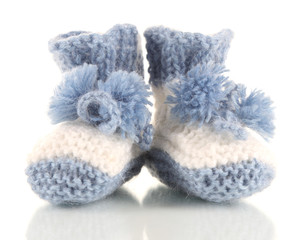 Crocheted booties for baby, isolated on white