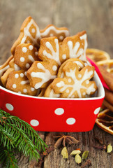 Fototapeta premium Christmas cookies in a beautiful red bowl