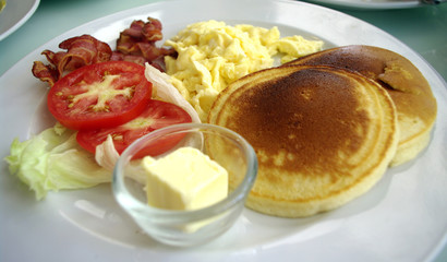 pancake, bacon, butter , scramble egg, american breakfast