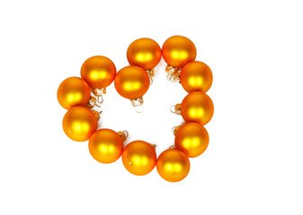 Heart shape of yellow Christmas balls