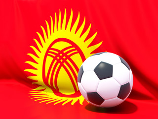 Flag of kyrgyzstan with football in front of it