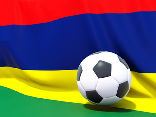 Fototapeta premium Flag of mauritius with football in front of it