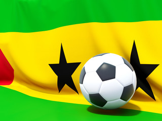 Flag of sao tome and principe with football in front of it