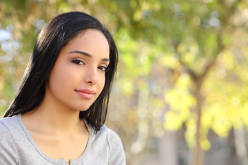 Portrait of a beautiful woman in a park