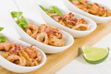 Fried Squid Rings - Pan fried squid rings with red pepper.