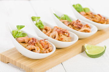 Fried Squid Rings - Pan fried squid rings with red pepper.