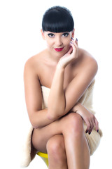 Fototapeta premium Thoughtful Young Woman Wearing a Towel
