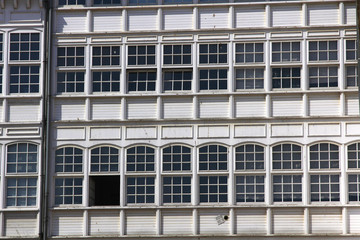 white wooden houses with large windows typical of the North of s