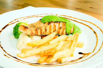 salmon steak with pesto sauce