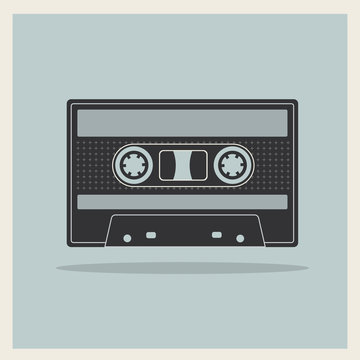 Audio  Compact Cassette Tape on Retro Background