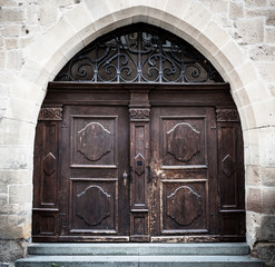 Big dark brown wooden door