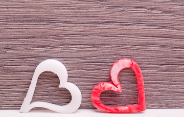 two fudge heart on wooden background